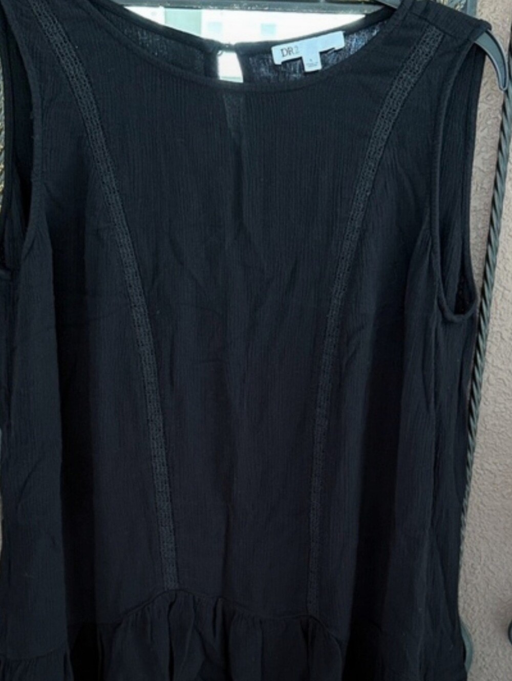 DR2 Black Sleeveless Ruffle Hem Blouse